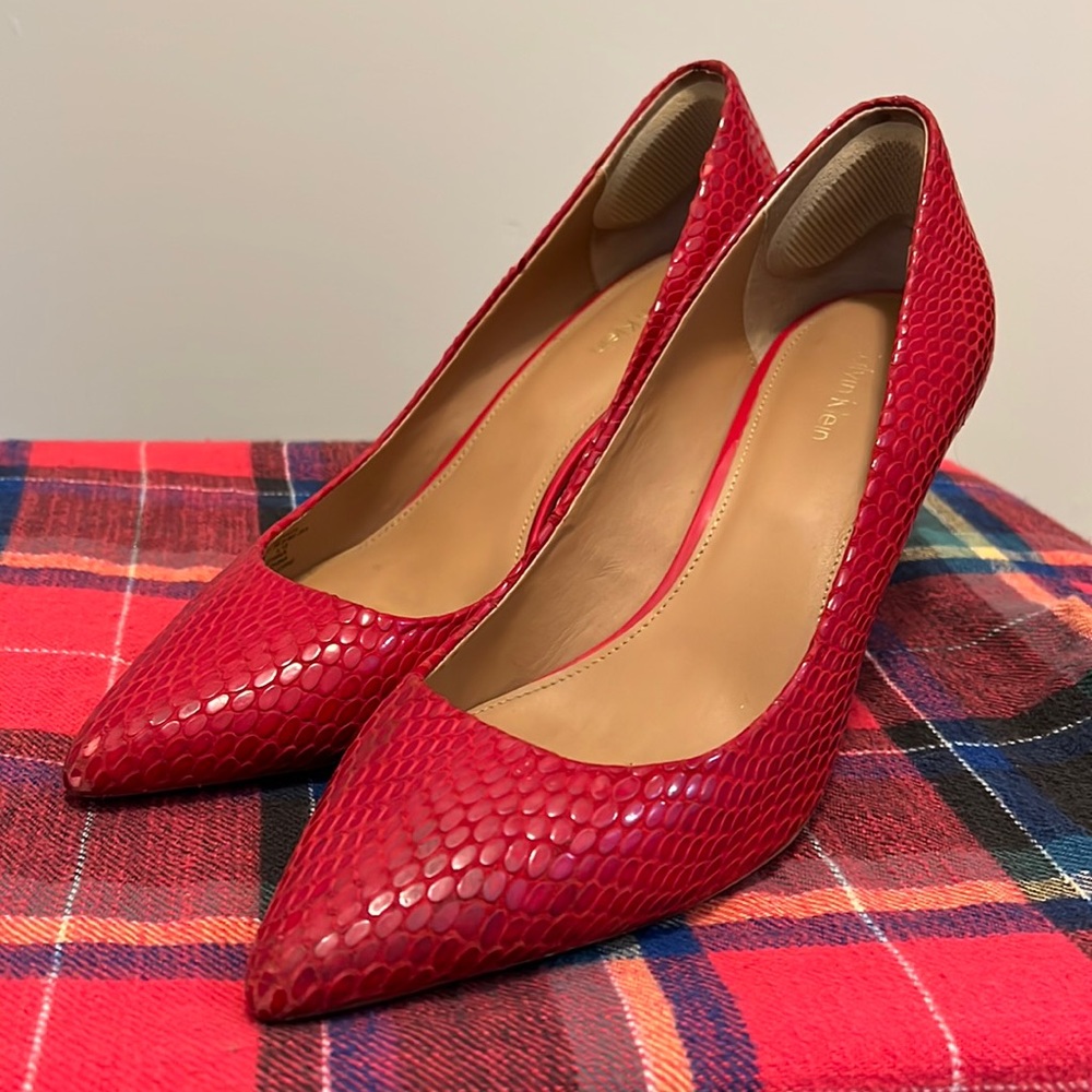 Red Calvin Klein pumps